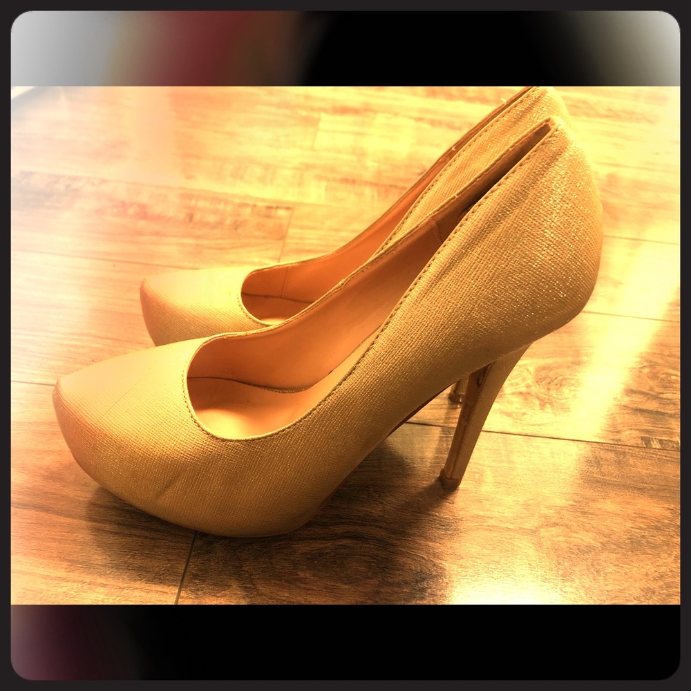Used gold sparkly heels